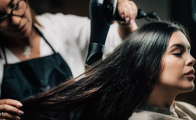 $49 for a Cut, Style + Full Colour or Partial Highlights Package (Up to a $130 Value)